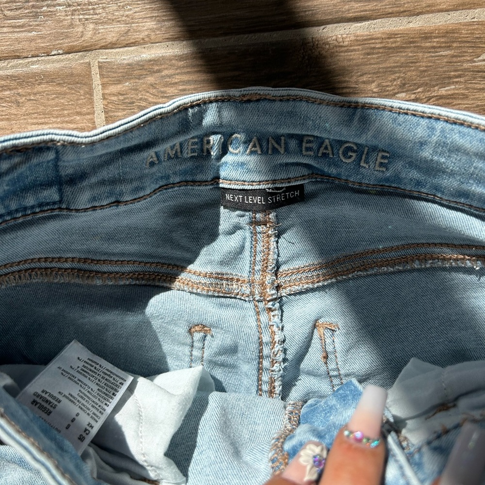 American eagle next level stretch light wash holeless jeans